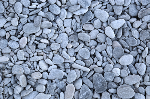 Foto Sea pebbles background