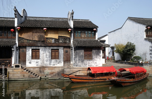 Traditional houses along the Grand Canal, ancient town of Yuehe in Jiaxing, Zhejiang Province, China photo