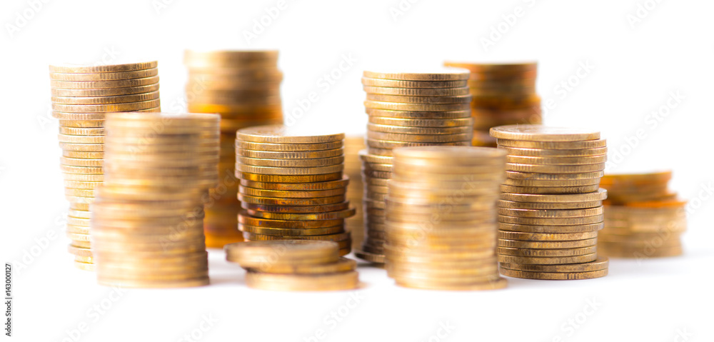 stacks of golden coins isolated on white background