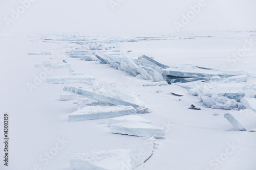 Ice floe. Winter landscape. Ice-drift of Baikal lake