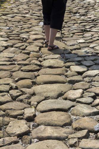 The person walking on stones Roman road
