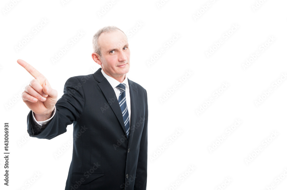 Middle aged elegant man showing index finger Middle aged elegant man showing index finger