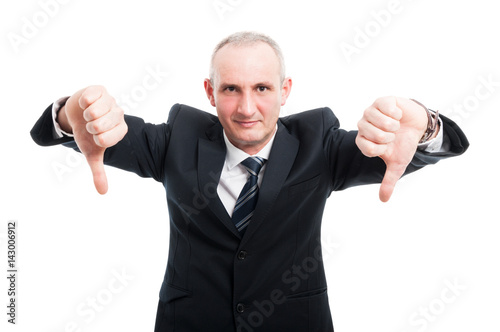 Middle aged elegant man showing double dislike gesture