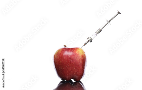 Genetically modified foods, apple pumped with chemicals