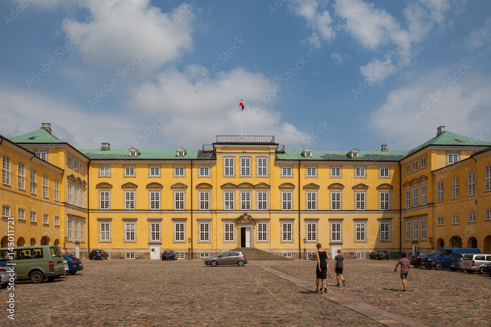 COPENHAGEN, DENMARK - 25 JUN 2016: Frederiksberg palace facade and walking people