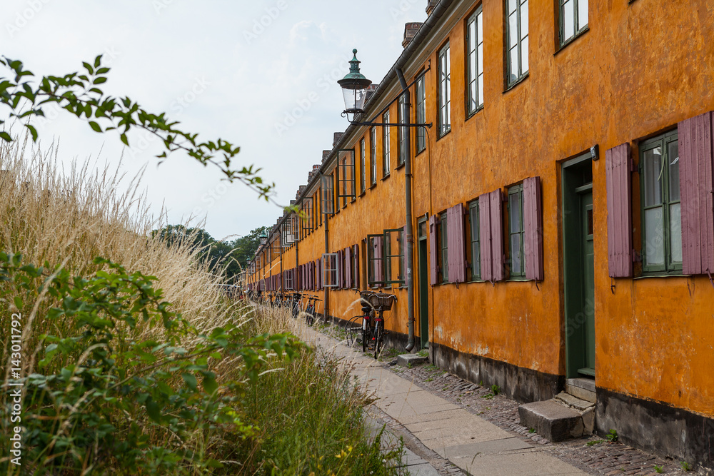 Facade of one of the houses of Nyboder district, Copenhagen, Denmark.
