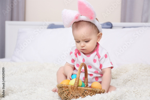 Cute funny baby with bunny ...
