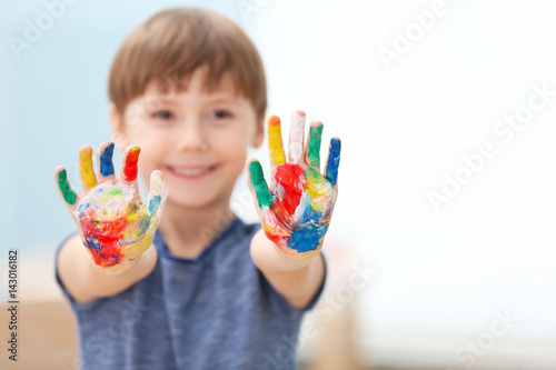 Cute little boy with hands ...