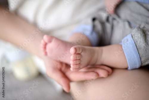 Closeup (Soft focus and blurry) : Baby feet in mother's hands