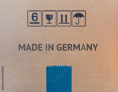 MADE IN GERMANY written on brown cardboard box.