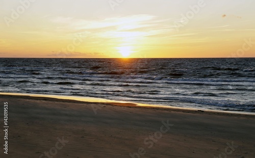 Sunset on the Baltic coast  the sun beyond the horizon