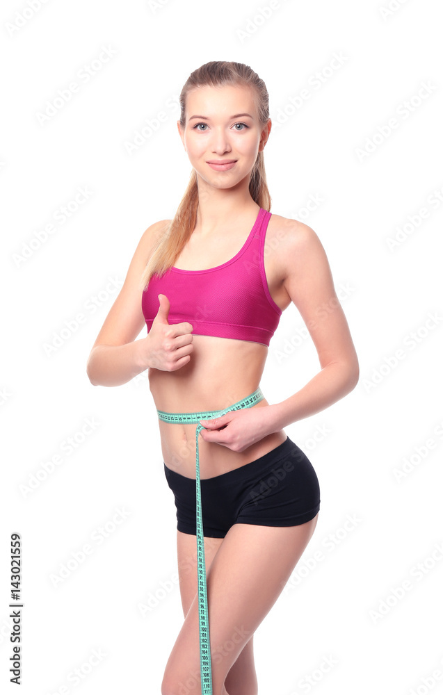 Diet concept. Young beautiful woman with measuring tape on white background Diet concept. Young beautiful woman with measuring tape on white background