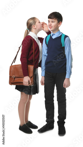 Cute boy and girl in school...