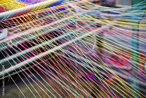 Fotografia, Obraz Loom weaving colors threads : Closeup