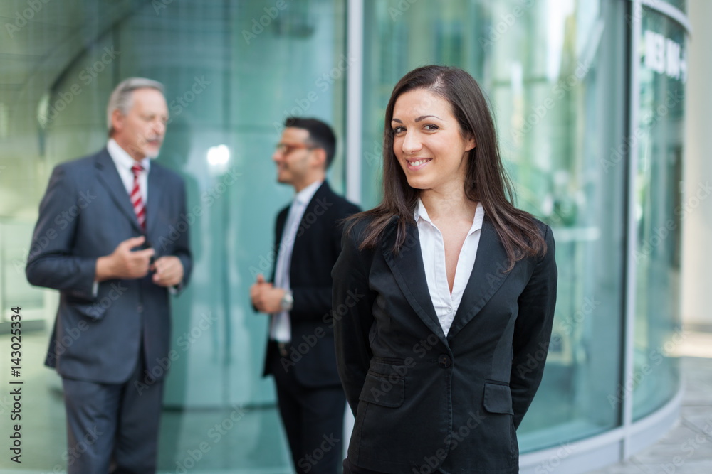 Business team in front of their office