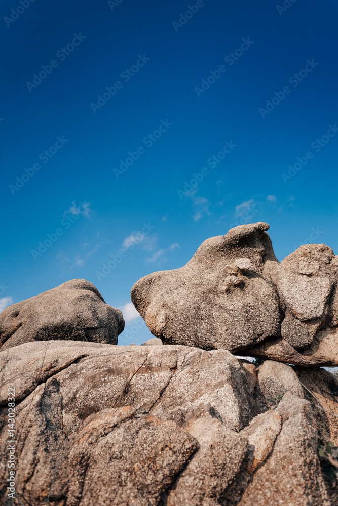 old stones with sunny sky background