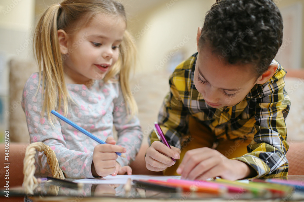 Fototapeta premium Little smart girl and boy.