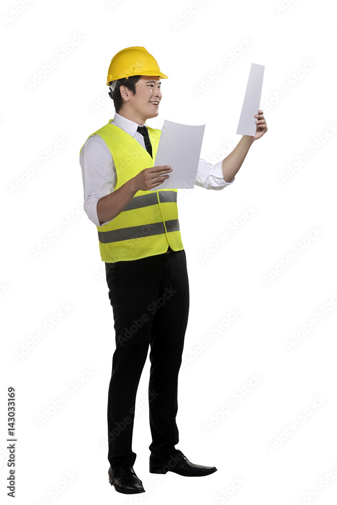 Attractive asian engineer with blueprint plan draft Attractive asian engineer with blueprint plan draft