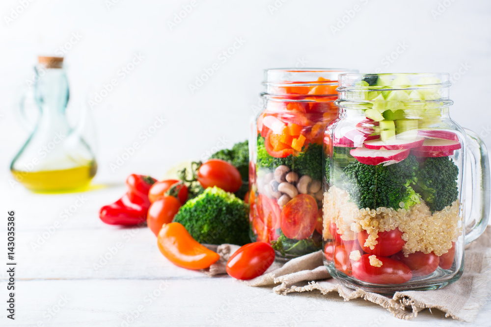 Healthy vegan salad in a mason jar with quinoa Healthy vegan salad in a mason jar with quinoa