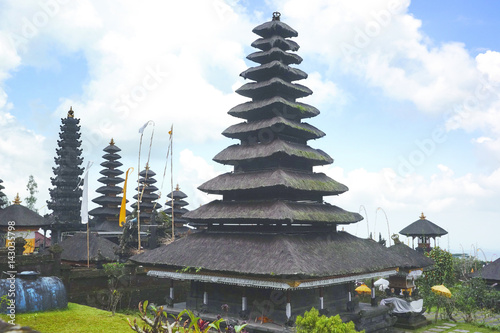 Black hindu temple rooftop building landscape at the celebration day of Galungan in the afternoon, Bali Indonesia.