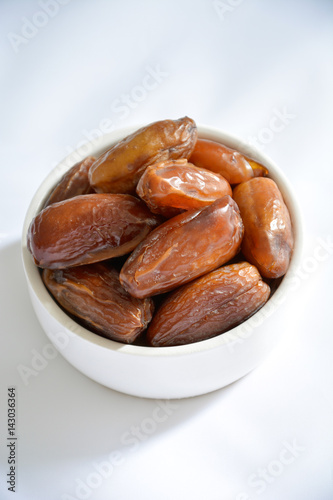 Closeup of a bowl of dried dates