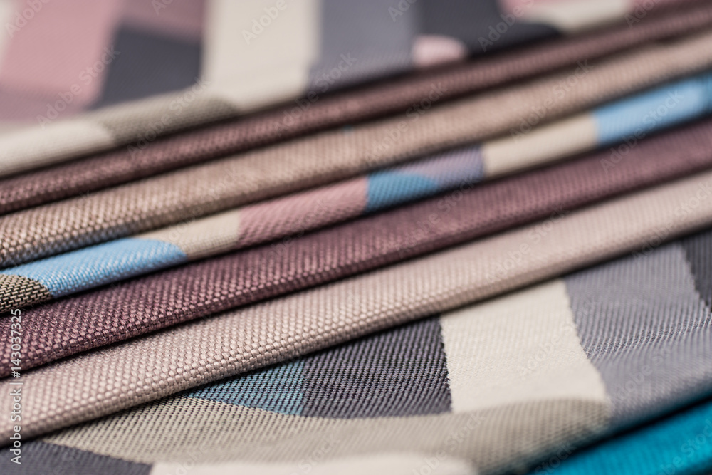 Colorful upholstery fabric samples background. Colorful upholstery fabric samples background.