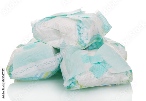 Fototapeta Naklejka Na Ścianę i Meble -  Used disposable diapers close-up isolated on white.