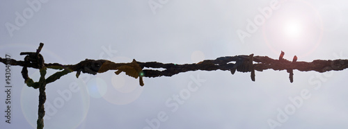 Photos Barbed wire at sunset