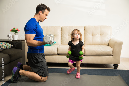 Father training her daughter