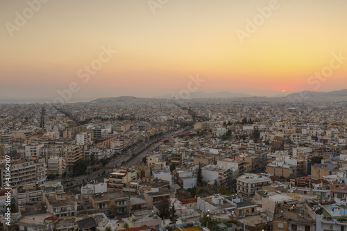 View of Athens from Filopappou hill at sunset, Greece.    © milangonda