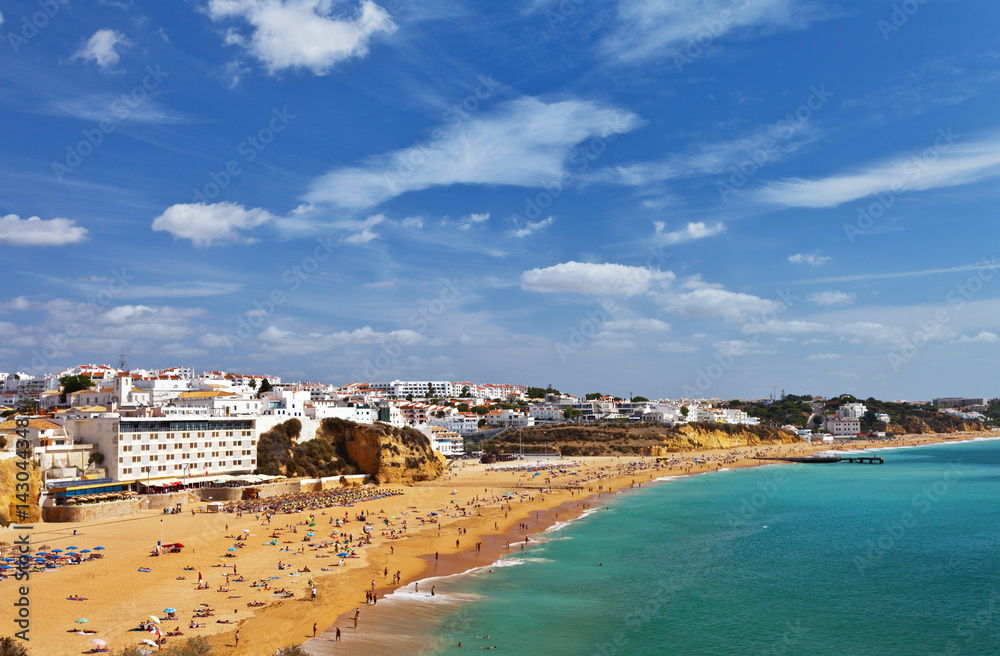 Portugal.  Algarve. Top view of the old town of Albufeira and the city beach on a sunny day