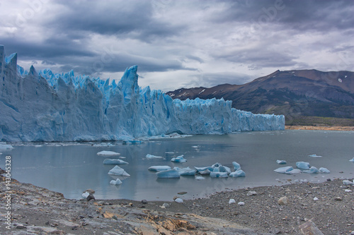 view of a glacier of Perito Moreno and ice floes in lake Argentino