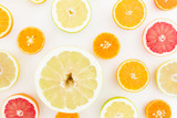 Citrus fruits on white background. Flat lay, top view.