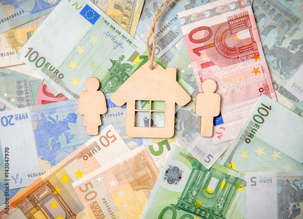 Symbol of home and family against the background of the Euro currency Symbol of home and family against the background of the Euro currency