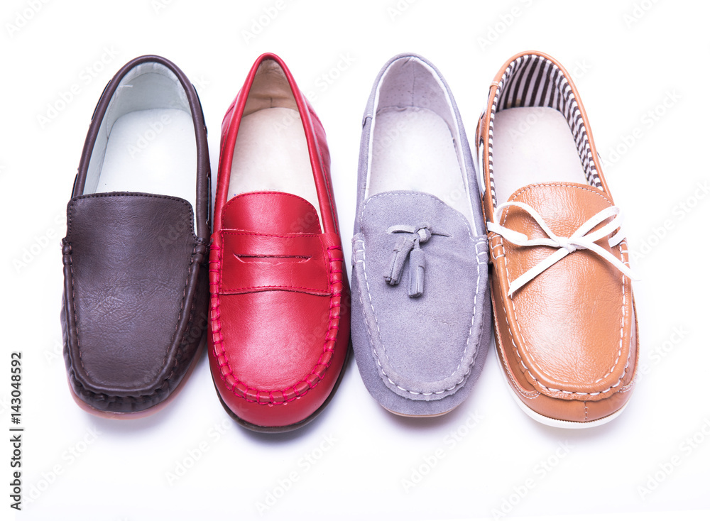 Teen red moccasins on a white background Teen red moccasins on a white background