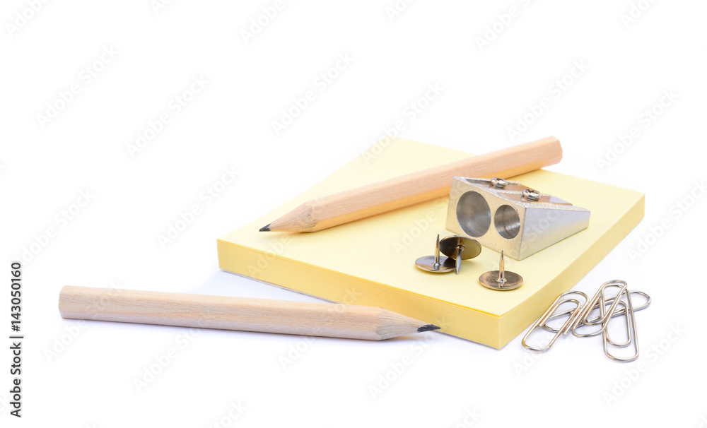Office supplies isolated on white background, pencil, paper, staples, pencil sharpeners, pushpins