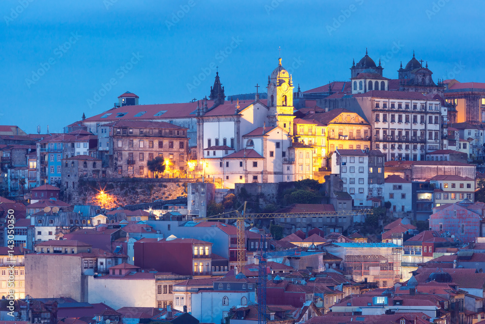 Picturesque aerial view of Historical part of Porto during evening blue hour, Portugal