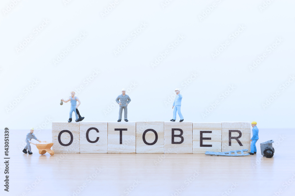 October words with Miniature people worker
