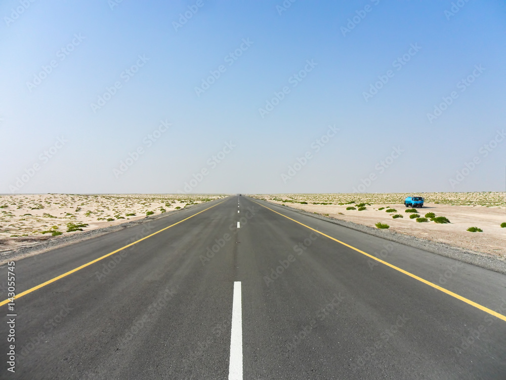 Long road in the desert of Oman