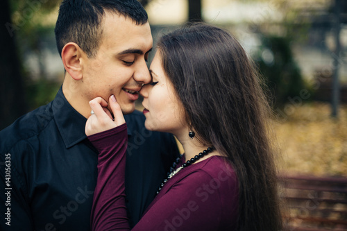 happy couple posing in city