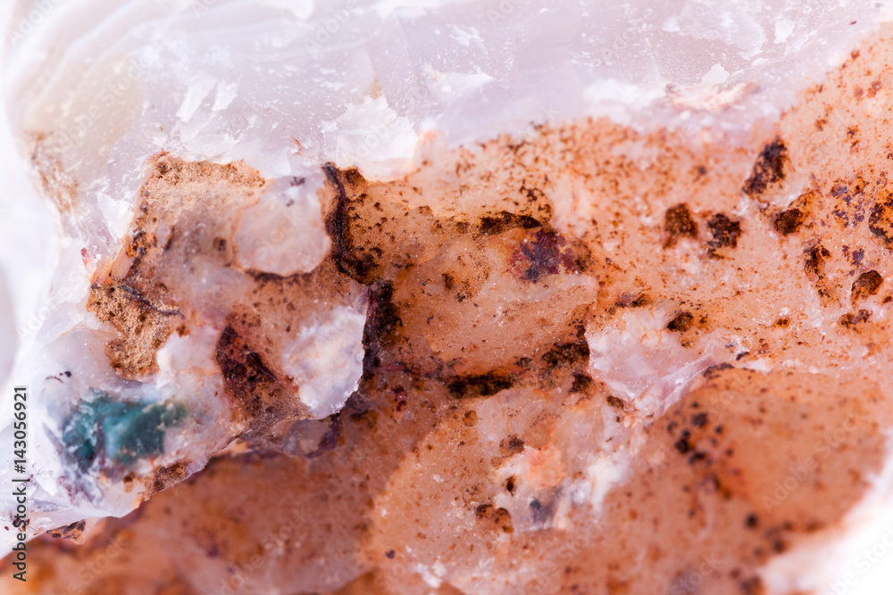 Fototapeta premium macro mineral dolomite stone on a white background