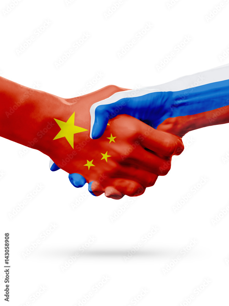 Flags China, Russia countries, partnership friendship handshake concept. Flags China, Russia countries, partnership friendship handshake concept.