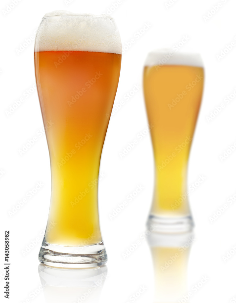 two beer glasses isolated on white background two beer glasses isolated on white background