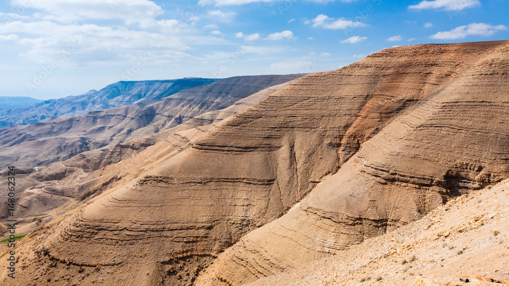 sedimentary mountain in valley of Wadi Mujib river