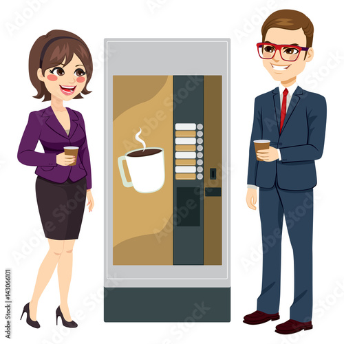 Two workers enjoying coffee standing next to vending machine