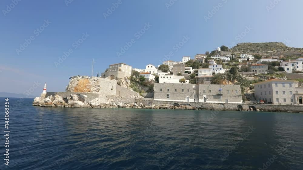 Exit harbour of Hydra island. Beautiful view from the sailboat. Exit harbour of Hydra island. Beautiful view from the sailboat.