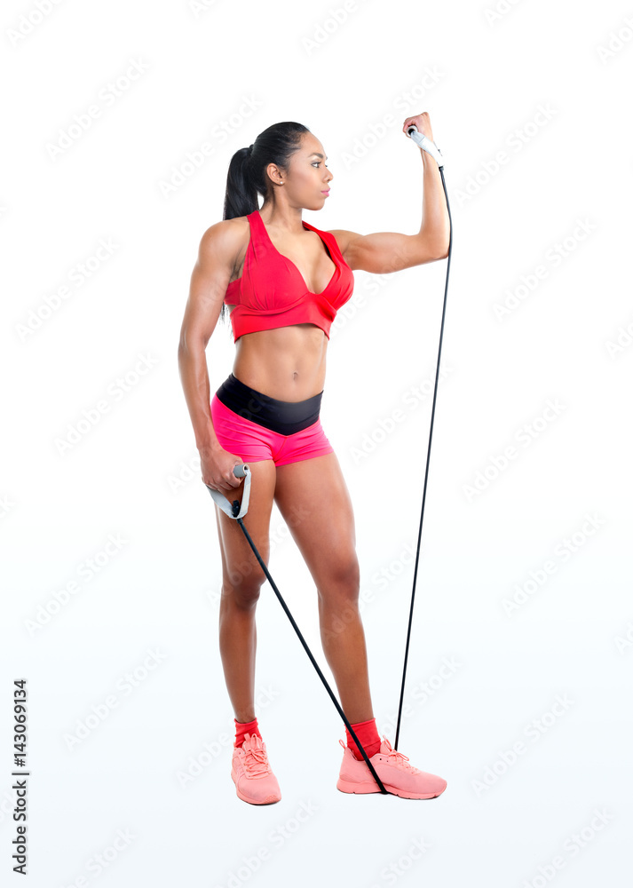 Beautiful girl and  gym equipment