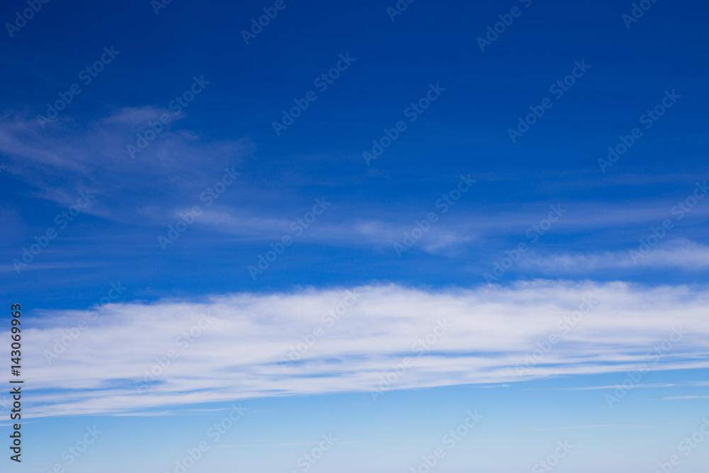 blue sky background with tiny