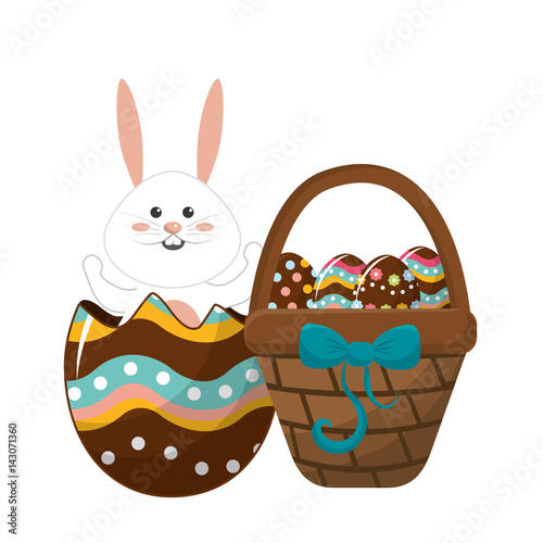 rabbit inside egg and hamper with eggs