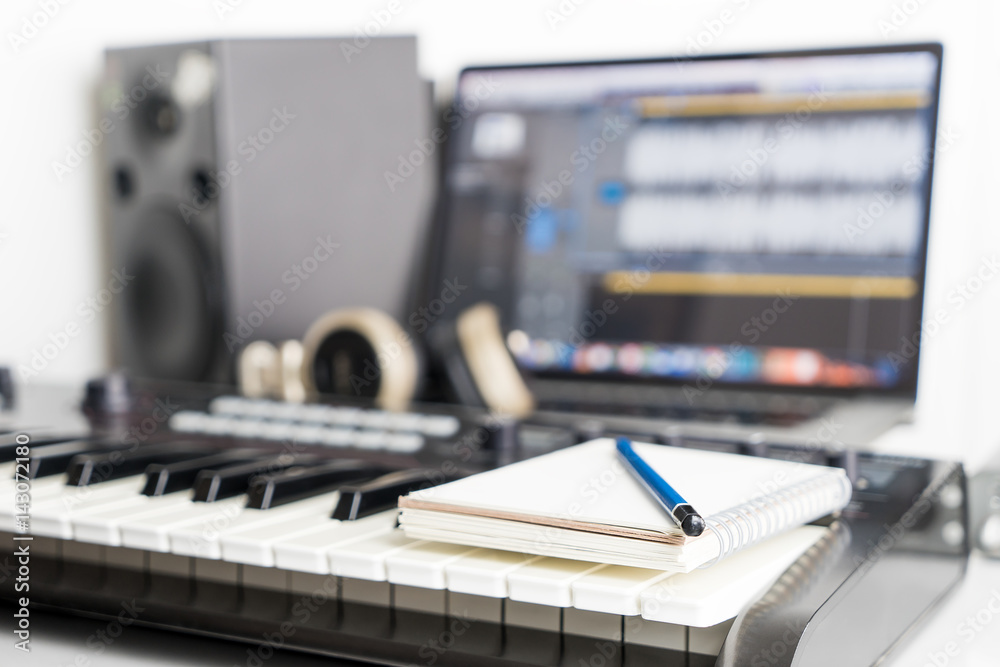 Obraz premium Blank notebook on music studio for song writing